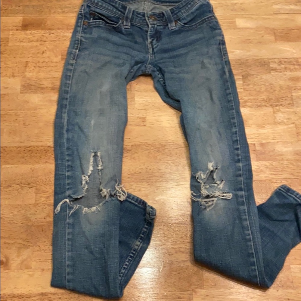Levi’s low rise ripped denim jeans